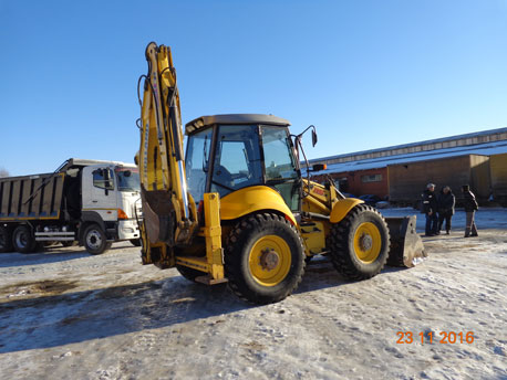 Колесный экскаватор-погрузчик New Holland LB 115B